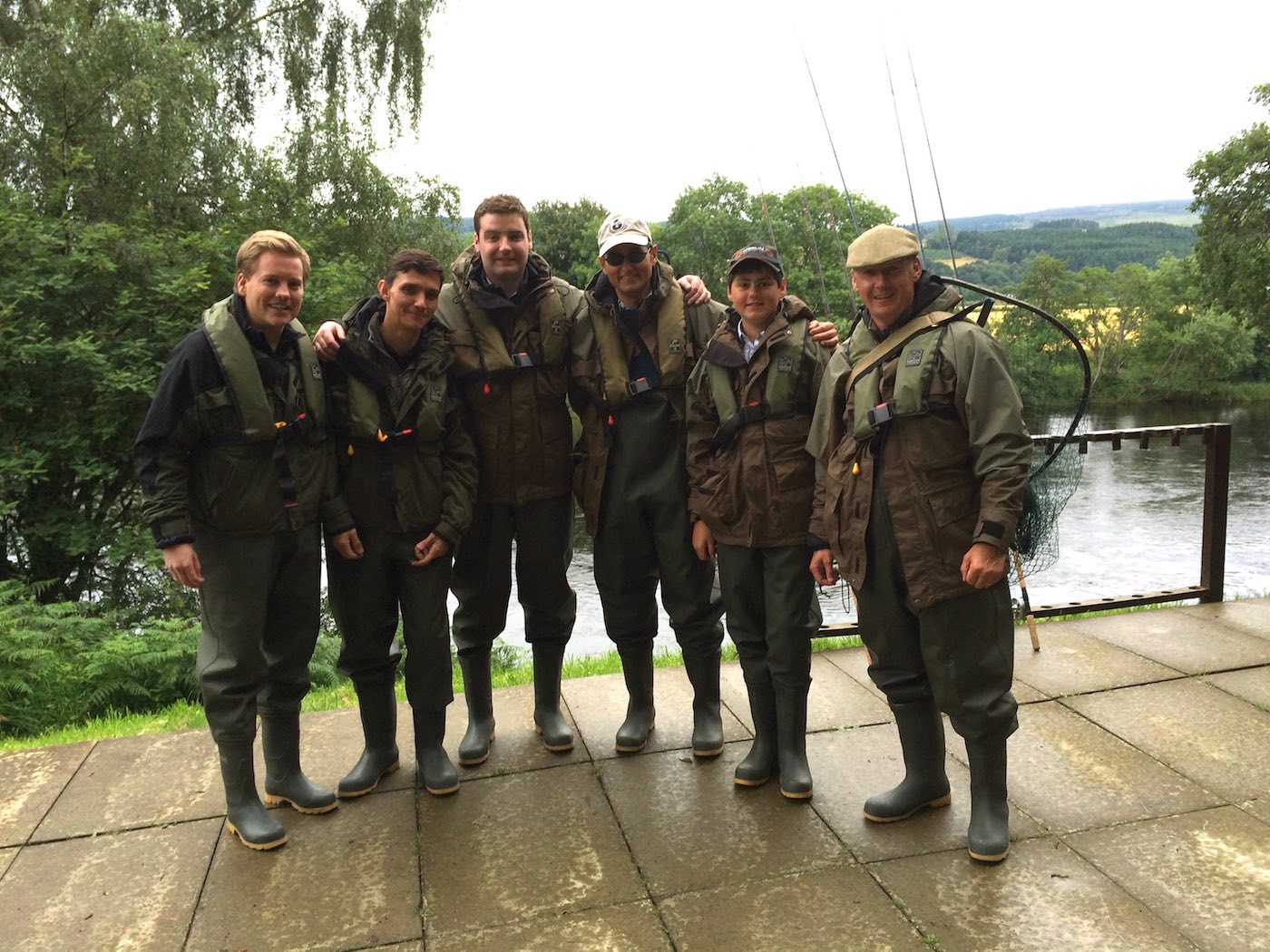 Here's myself with a group of 5 salmon event fishing day guests on the River Tay near Dunkeld. Bigger fishing groups are becoming more popular on the Scottish salmon rivers and adding a professionally catered fishing hut lunch to the day is a lovely touch. This fine salmon fishing group shot was taken outside the Kinnaird fishing hut on the River Tay in Perthshire.