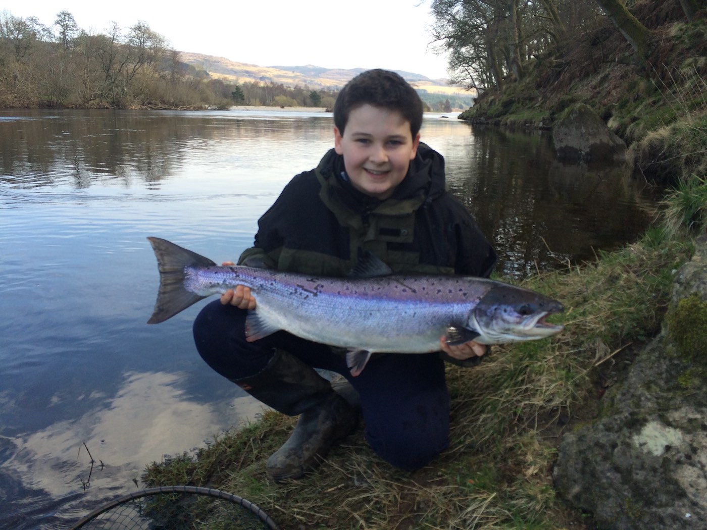 Here's Johnny Monteith with another fine Spring salmon which he hooked opposite the sand bank at the Upper Kinnaird Beat's Rock Pool during April. This perfect salmon weighed 14lbs and took an ABU Toby silver & copper coloured spinning lure which was selected and tied on by his professional salmon guide.