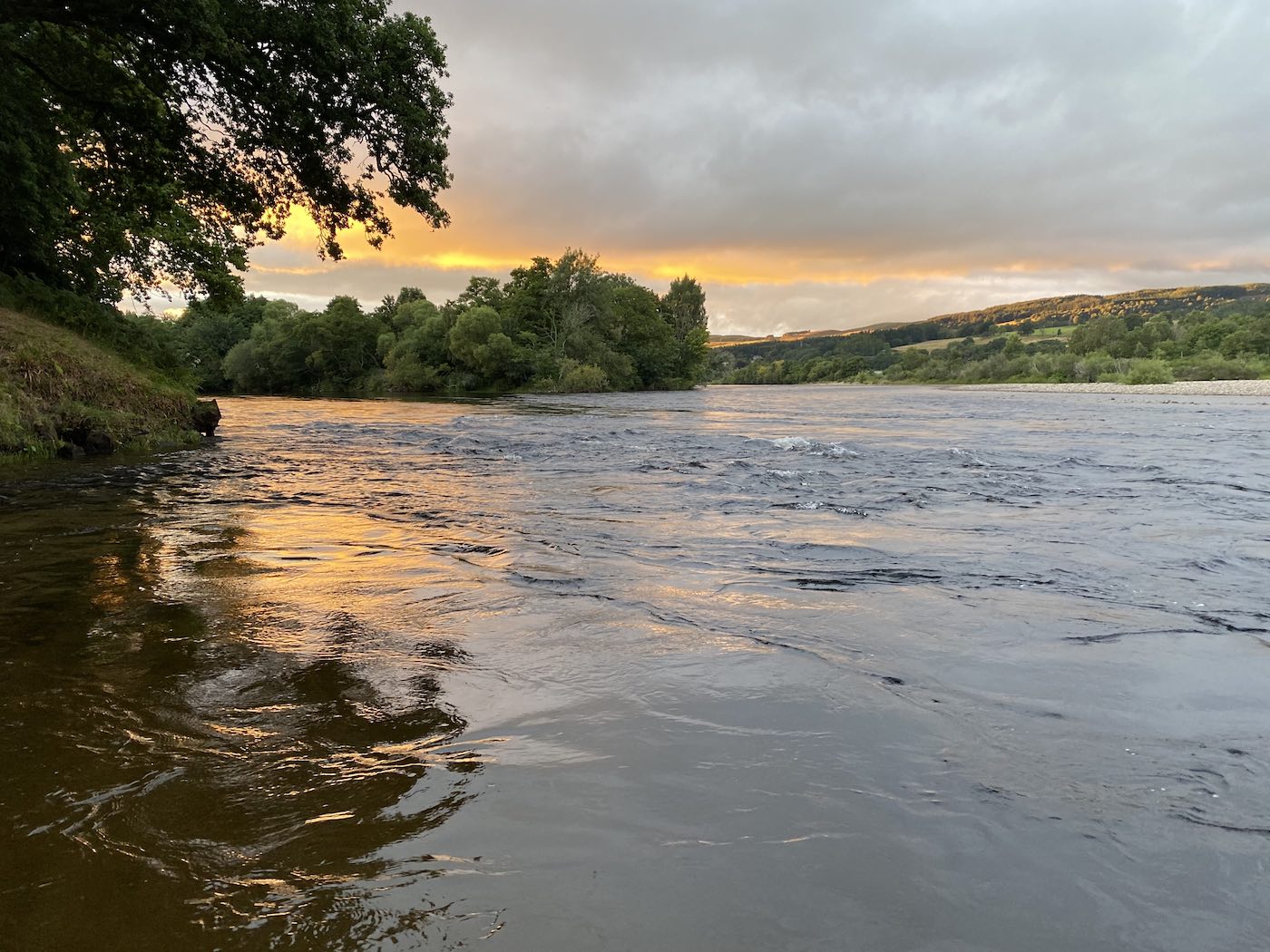 Here's a lovely dusk shot pointing right across the Tay and up into the River Tummel which is a great area of the Tay Valley for catching salmon. This area fishes well from March through to October each year and is located between the towns of Pitlochry & Dunkeld which have an abundance of quality accommodation options. Look at the high water and stormy sky in this picture.