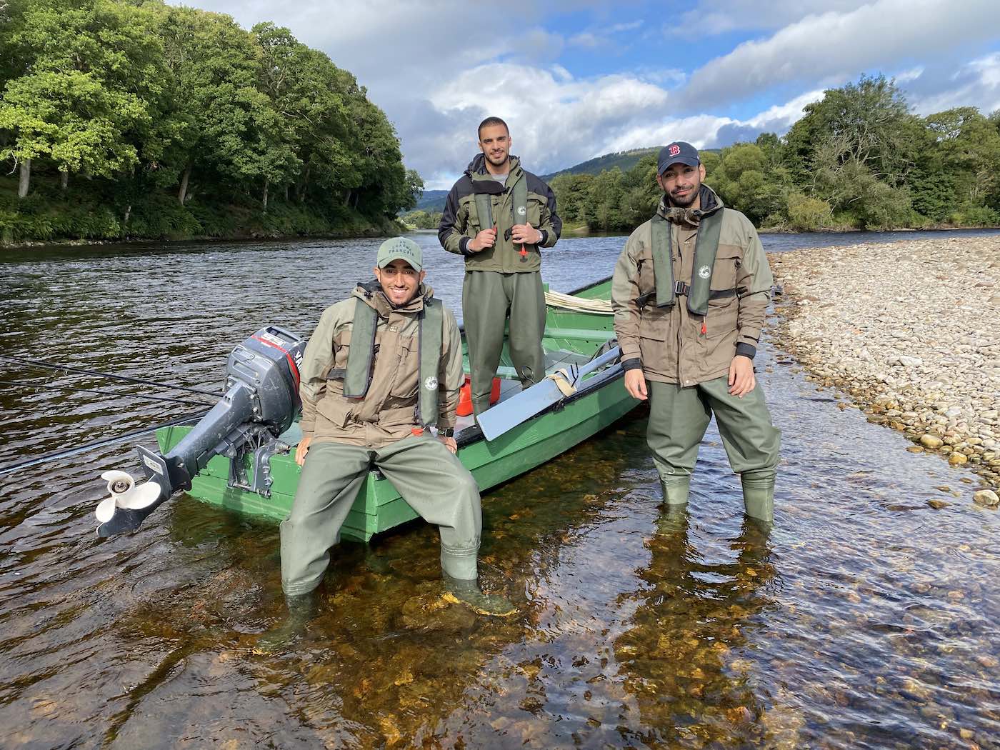 Here's a team of visiting Arabian guests who came up from London for a day of river therapy on Scotland's famous River Tay. This lovely group shot of them sitting in my traditional salmon fishing boat was taken at the mouth of the River Tummel which is a great fishing area close to the Perthshire town of Pitlochry.