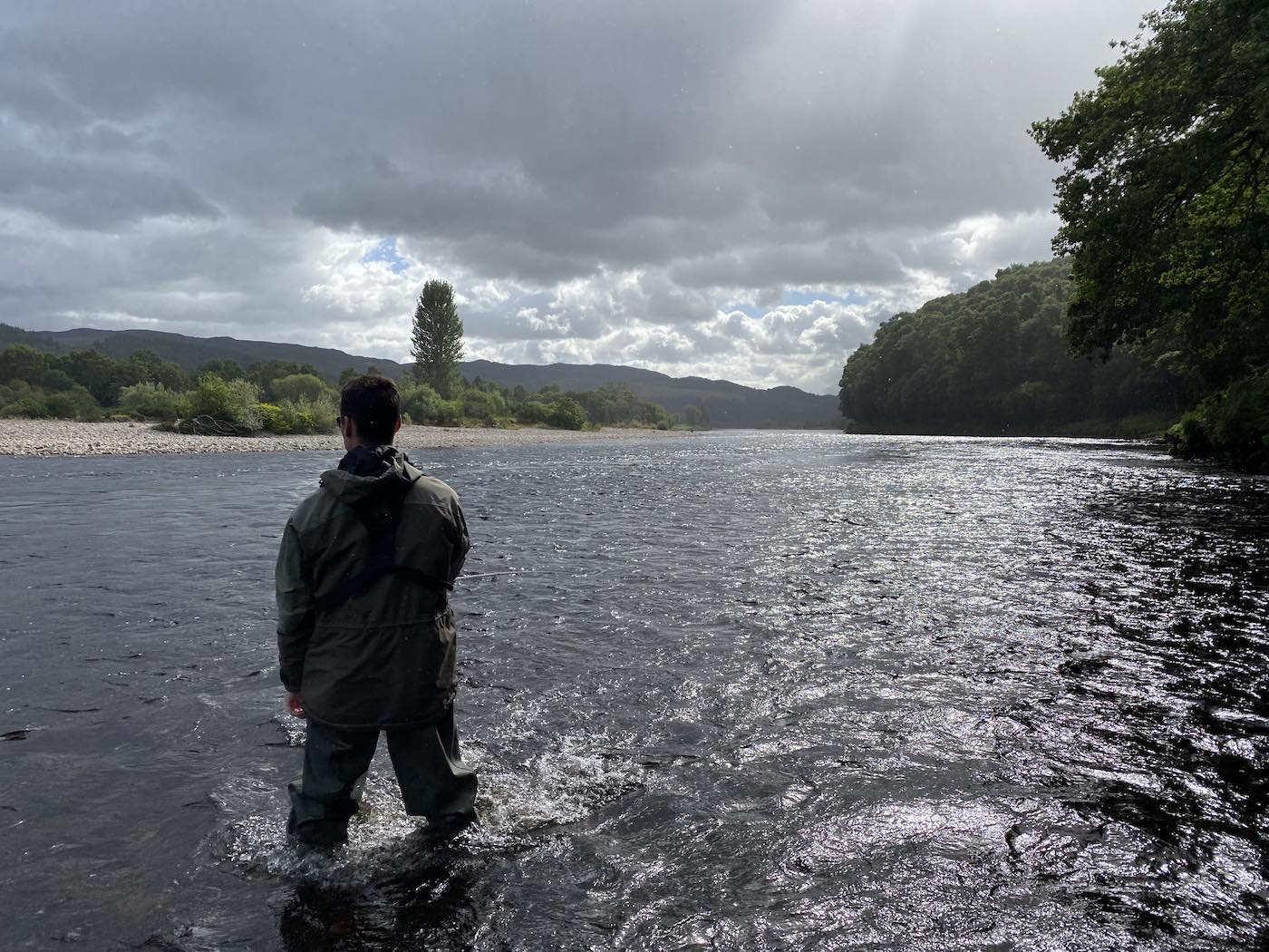 Here's a guided River Tay salmon fishing guest out learning the basics of how to fish for salmon. You can see the beautiful oak tree to the right of frame which are numerous on the riverbanks of the Tay Valley. This fast flowing water is opposite the mouth of the River Tummel on Kinnaird.