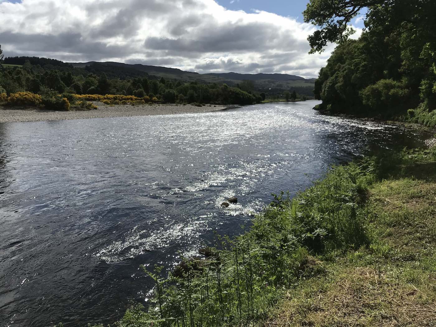 Here's a truly amazing piece of salmon water on the Kinnaird Estate near Pitlochry which is a firm favourite for visiting salmon anglers. Salmon love to sit close in to this riverbank beside the broken water riffles you can see in this photograph. Personally I seldom fail to hook a salmon while fishing through this perfect River Tay salmon pool.